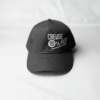 casquette adulte, coloris gris, visière courbée, taille réglable, modèle mixte, logo Creuse ta Route brodé, accessoire confortable et léger, disponible sur l’e-shop Creuse ta Route